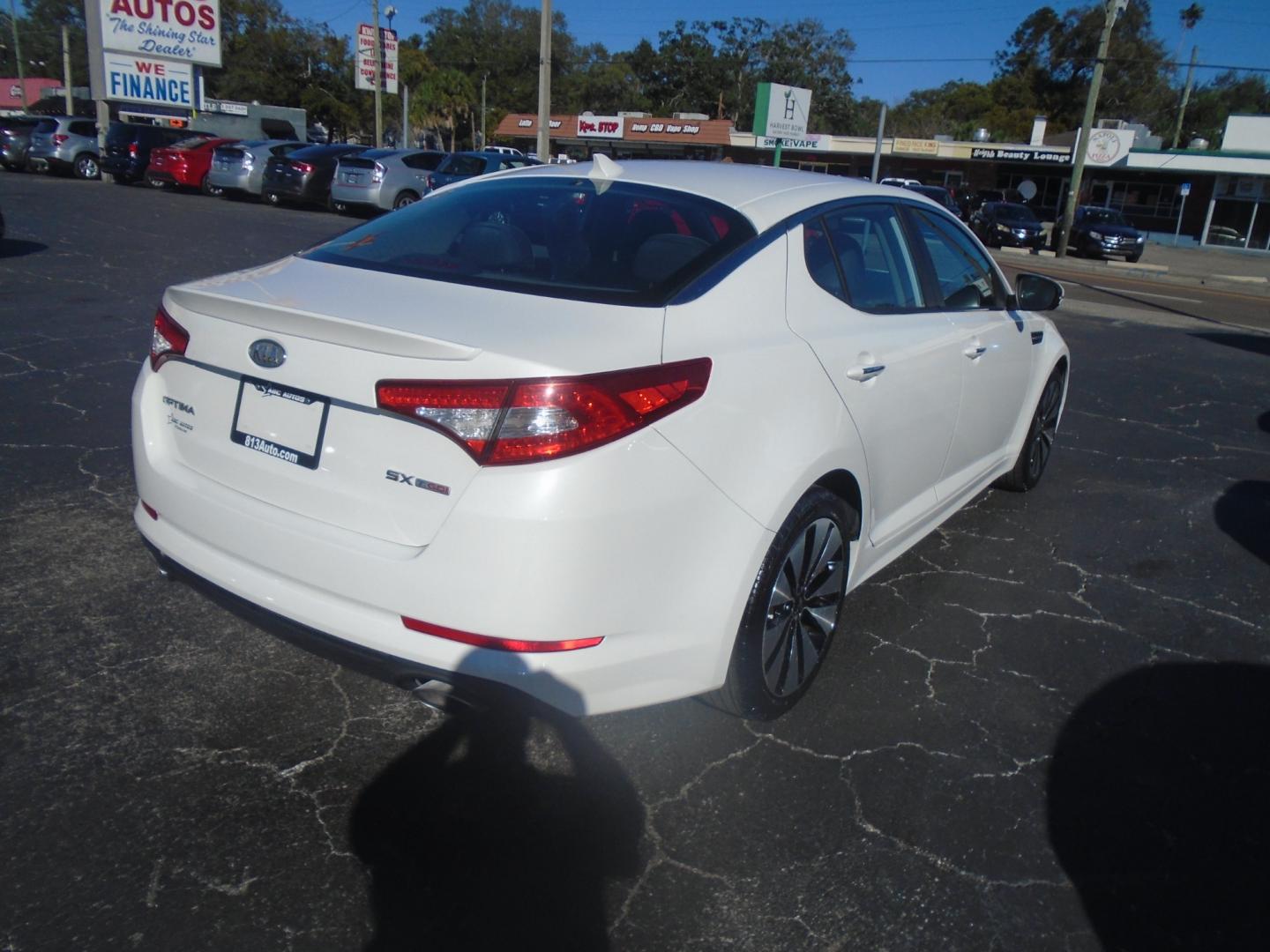 2012 Kia Optima (5XXGR4A62CG) , located at 6112 N Florida Avenue, Tampa, FL, 33604, (888) 521-5131, 27.954929, -82.459534 - Photo#3